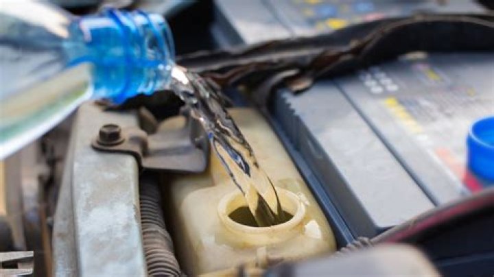 Can I use water as coolant in my car?