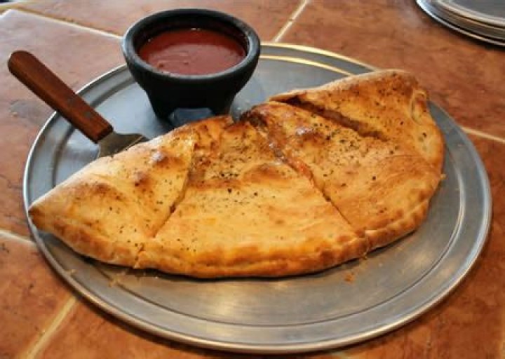 Why is a calzone called a calzone?